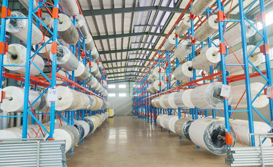 Which kind of roll material rack has a larger storage capacity?